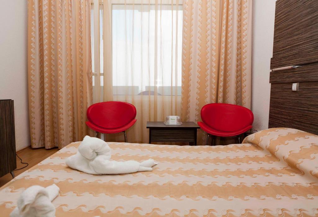 Hotel Capitol Jupiter Szoba fotó